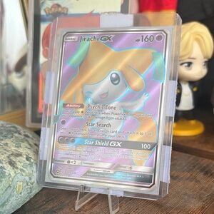 Pokemon Jirachi GX Trading Card - Blue and Gold